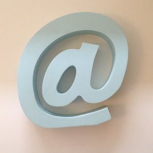 Standing wooden @ sign